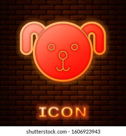 Glowing neon Dog zodiac sign icon isolated on brick wall background. Astrological horoscope collection.  Vector Illustration