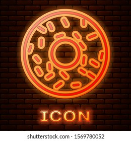 Glowing neon Donut with sweet glaze icon isolated on brick wall background.  Vector Illustration