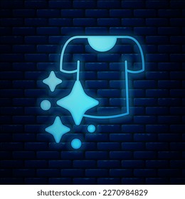 Glowing neon Drying clothes icon isolated on brick wall background. Clean shirt. Wash clothes on a rope with clothespins. Clothing care and tidiness.  Vector