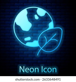 Glowing neon Earth globe and leaf icon isolated on brick wall background. World or Earth sign. Geometric shapes. Environmental concept.  Vector