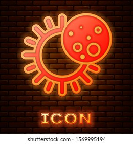 Glowing neon Eclipse of the sun icon isolated on brick wall background. Total sonar eclipse.  Vector Illustration