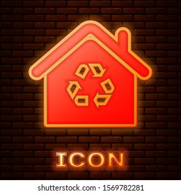 Glowing neon Eco House with recycling symbol icon isolated on brick wall background. Ecology home with recycle arrows.  Vector Illustration