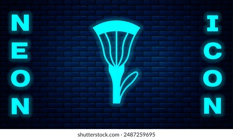 Glowing neon Egyptian lotus icon isolated on brick wall background.  Vector