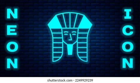 Glowing neon Egyptian pharaoh icon isolated on brick wall background.  Vector