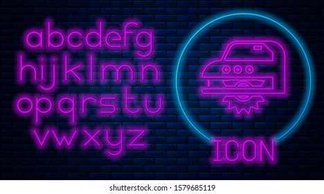 Glowing neon Electric circular saw with steel toothed disc icon isolated on brick wall background. Electric hand tool for cutting wood or metal. Neon light alphabet. Vector Illustration