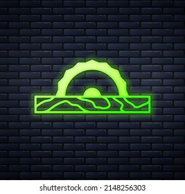 Glowing neon Electric circular saw with steel toothed disc icon isolated on brick wall background. Electric hand tool for cutting wood or metal.  Vector