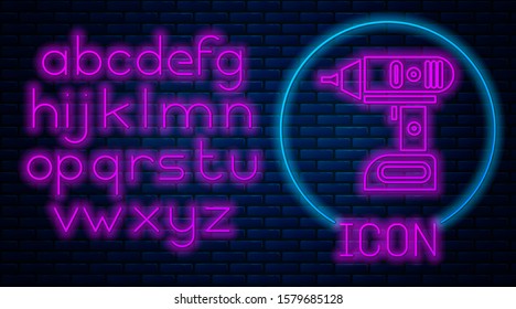 Glowing neon Electric cordless screwdriver icon isolated on brick wall background. Electric drill machine. Repair tool. Neon light alphabet. Vector Illustration