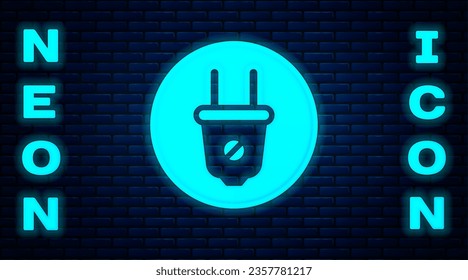 Glowing neon Electric plug icon isolated on brick wall background. Concept of connection and disconnection of the electricity.  Vector