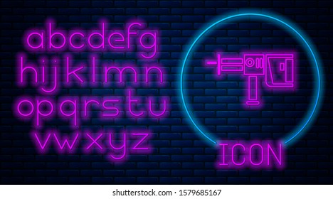 Glowing neon Electric rotary hammer drill machine icon isolated on brick wall background. Working tool for construction, finishing, repair work. Neon light alphabet. Vector Illustration