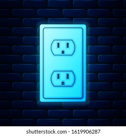 Glowing neon Electrical outlet in the USA icon isolated on brick wall background. Power socket.  Vector Illustration