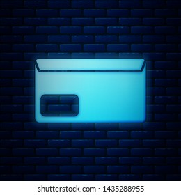 Glowing neon Envelope icon isolated on brick wall background. Email message letter symbol.  Vector Illustration