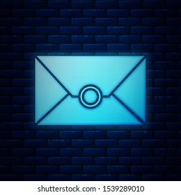 Glowing neon Envelope icon isolated on brick wall background. Email message letter symbol.  Vector Illustration