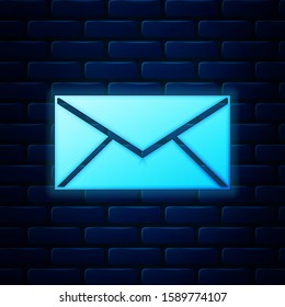 Glowing neon Envelope icon isolated on brick wall background. Email message letter symbol.  Vector Illustration