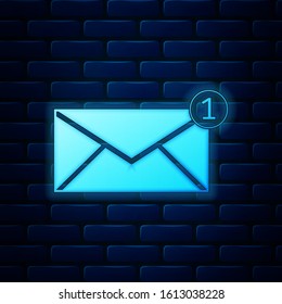 Glowing neon Envelope icon isolated on brick wall background. Received message concept. New, email incoming message, sms. Mail delivery service.  Vector Illustration