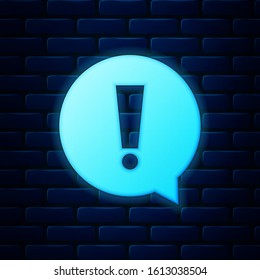 Glowing neon Exclamation mark in circle icon isolated on brick wall background. Hazard warning symbol.  Vector Illustration
