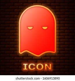 Glowing neon Executioner mask icon isolated on brick wall background. Hangman, torturer, executor, tormentor, butcher, headsman icon.  Vector Illustration