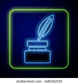 Glowing neon Feather and inkwell icon isolated on blue background.  Vector Illustration