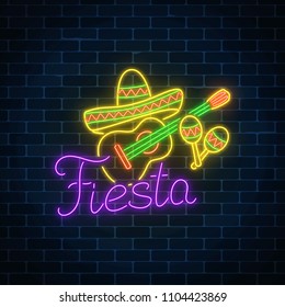 Glowing neon fiesta holiday sign on dark brick wall background. Mexican festival flyer design with guitar, maracas and sombrero hat. Vector illustration.