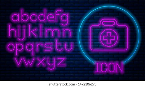 Glowing neon First aid kit icon isolated on brick wall background. Medical box with cross. Medical equipment for emergency. Healthcare concept. Neon light alphabet. Vector Illustration