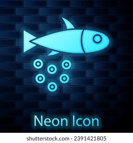 Glowing neon Fish with caviar icon isolated on brick wall background.  Vector