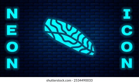 Glowing neon Fish steak icon isolated on brick wall background.  Vector
