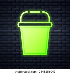Glowing neon Fishing bucket icon isolated on brick wall background. Fish in a bucket.  Vector