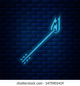 Glowing neon Flame arrow icon isolated on brick wall background. Hipster arrow icon.  Vector Illustration