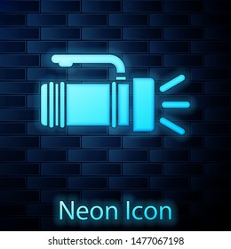 Glowing neon Flashlight icon isolated on brick wall background. Tourist flashlight handle.  Vector Illustration