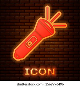 Glowing neon Flashlight icon isolated on brick wall background.  Vector Illustration