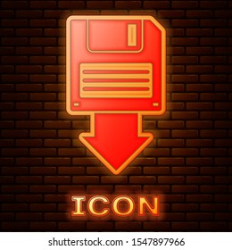 Glowing neon Floppy disk backup icon isolated on brick wall background. Diskette sign.  Vector Illustration