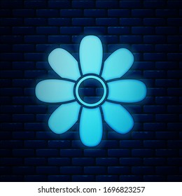Glowing neon Flower icon isolated on brick wall background. 8 March. International Happy Women Day.  Vector Illustration