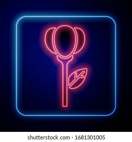 Glowing neon Flower tulip icon isolated on blue background.  Vector Illustration