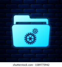 Glowing neon Folder settings with gears icon isolated on brick wall background. Concept of software update, transfer protocol, router, teamwork tool management, copy process.  Vector Illustration