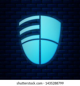 Glowing neon Football club logo template icon isolated on brick wall background. Design element for logo, label, emblem, sign, poster.  Vector Illustration
