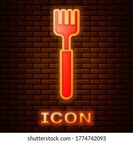 Glowing neon Fork icon isolated on brick wall background. Cutlery symbol. Vector Illustration