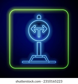 Glowing neon Fork in the road icon isolated on blue background.  Vector