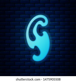 Glowing neon French curves icon isolated on brick wall background. Sewing equipment.  Vector Illustration