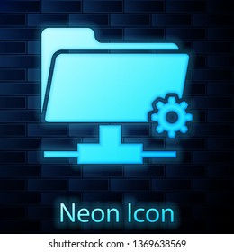 Glowing neon FTP settings folder icon on brick wall background. Concept of software update, transfer protocol, router, teamwork tool management, copy process. Vector Illustration