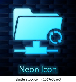 Glowing neon FTP sync refresh icon on brick wall background. Concept of software update, transfer protocol, router, teamwork tool management, copy process. Vector Illustration