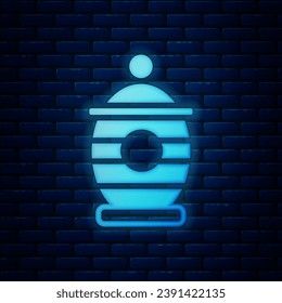 Glowing neon Funeral urn icon isolated on brick wall background. Cremation and burial containers, columbarium vases, jars and pots with ashes.  Vector