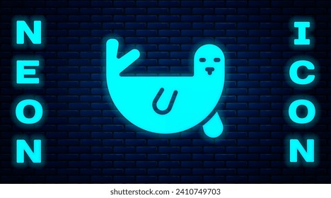 Glowing neon Fur seal animal icon isolated on brick wall background.  Vector