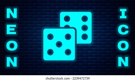 Glowing neon Game dice icon isolated on brick wall background. Casino gambling.  Vector