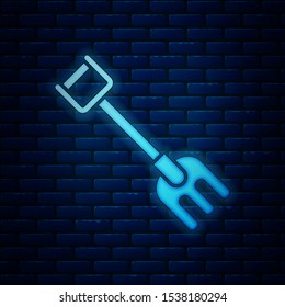 Glowing neon Garden rake icon isolated on brick wall background. Tool for horticulture, agriculture, farming. Ground cultivator. Housekeeping equipment.  Vector Illustration