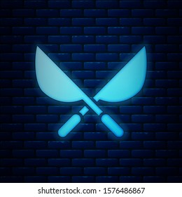 Glowing neon Gardening handmade scissors for trimming icon isolated on brick wall background. Pruning shears with wooden handles.  Vector Illustration