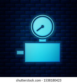 Glowing neon Gauge scale icon isolated on brick wall background. Satisfaction, temperature, manometer, risk, rating, performance, speed tachometer.  Vector Illustration