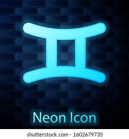 Glowing neon Gemini zodiac sign icon isolated on brick wall background. Astrological horoscope collection.  Vector Illustration