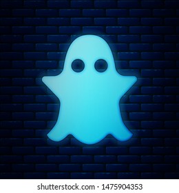 Glowing neon Ghost icon isolated on brick wall background.  Vector Illustration
