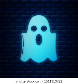 Glowing neon Ghost icon isolated on brick wall background. Happy Halloween party.  Vector Illustration