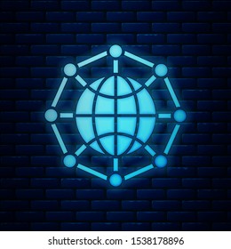 Glowing neon Global technology or social network icon isolated on brick wall background.  Vector Illustration