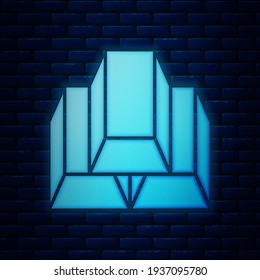 Glowing neon Gold bars icon isolated on brick wall background. Banking business concept.  Vector